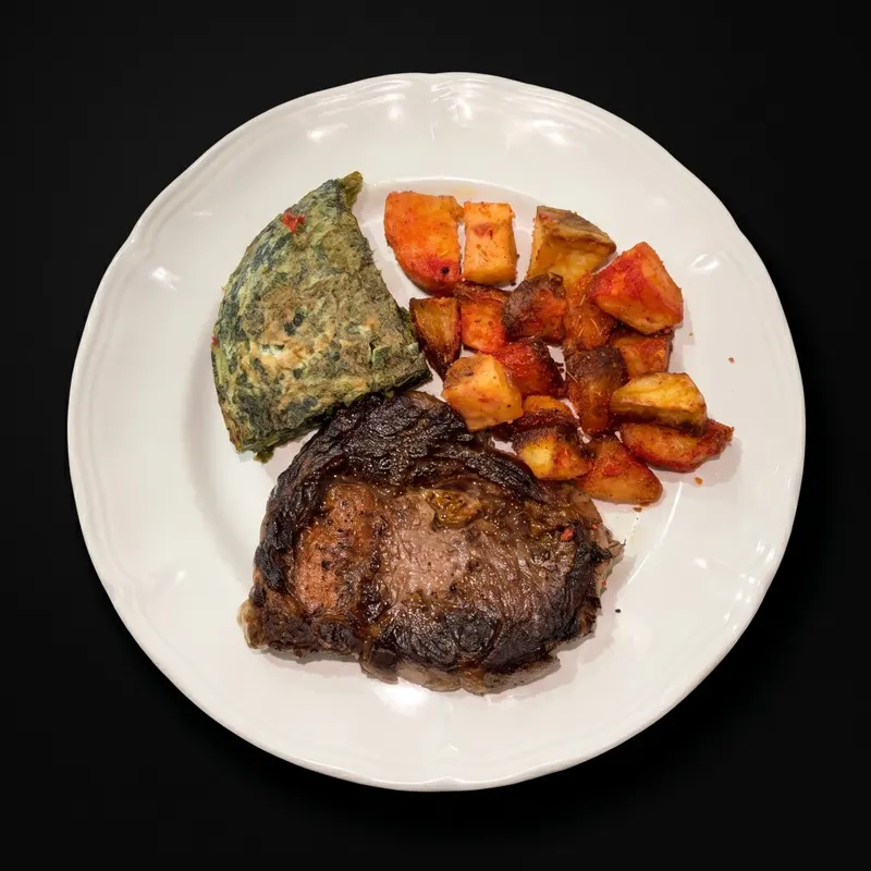 Ojo de Bife con papa al horno y tortilla de acelga